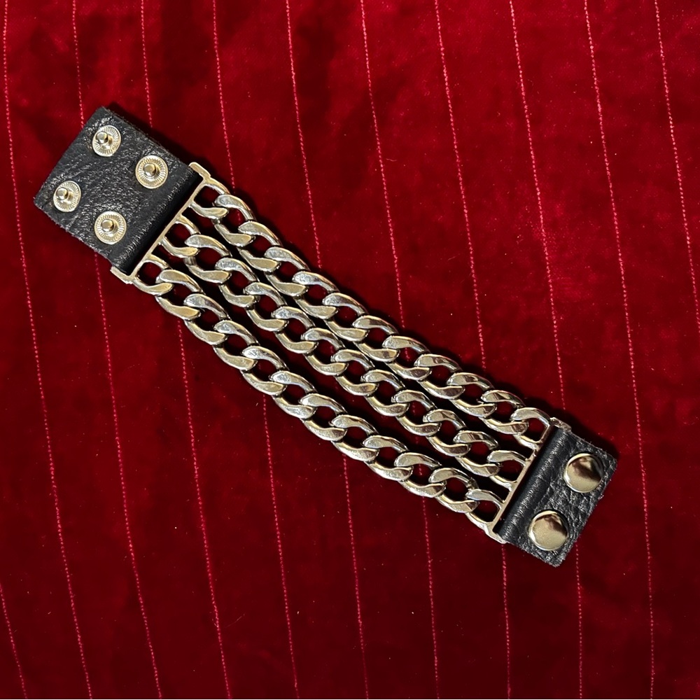 King Star black leather and silver tone Chain bracelet.